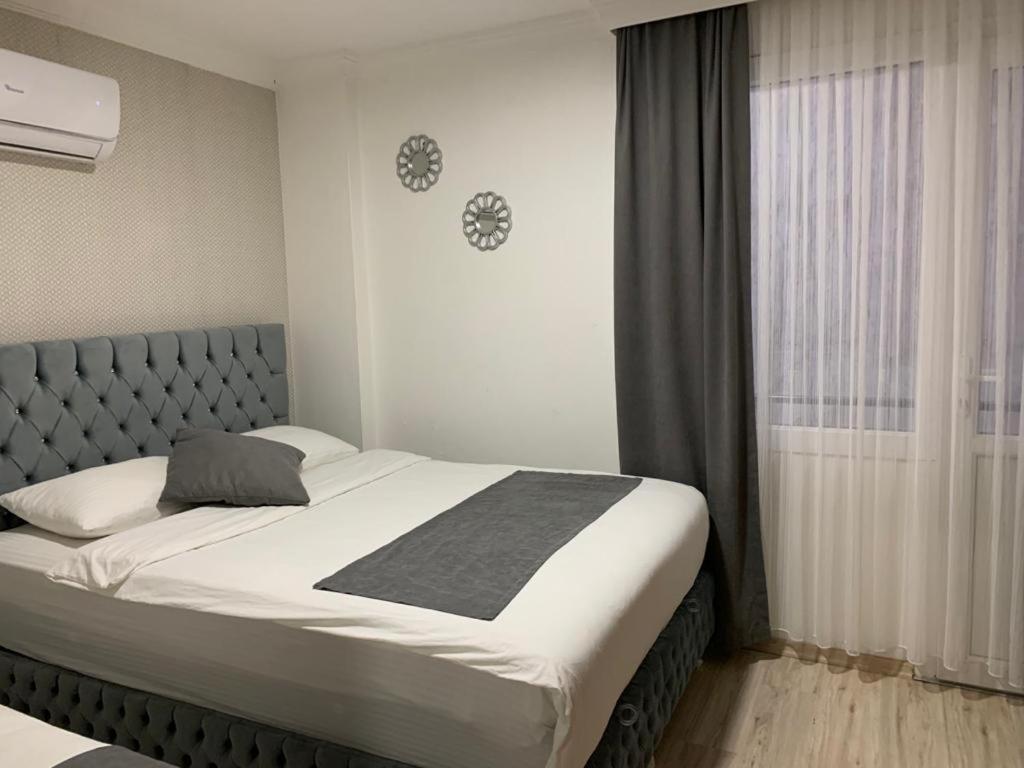 Hotelamsterdam คูซาดาซี ภายนอก รูปภาพ