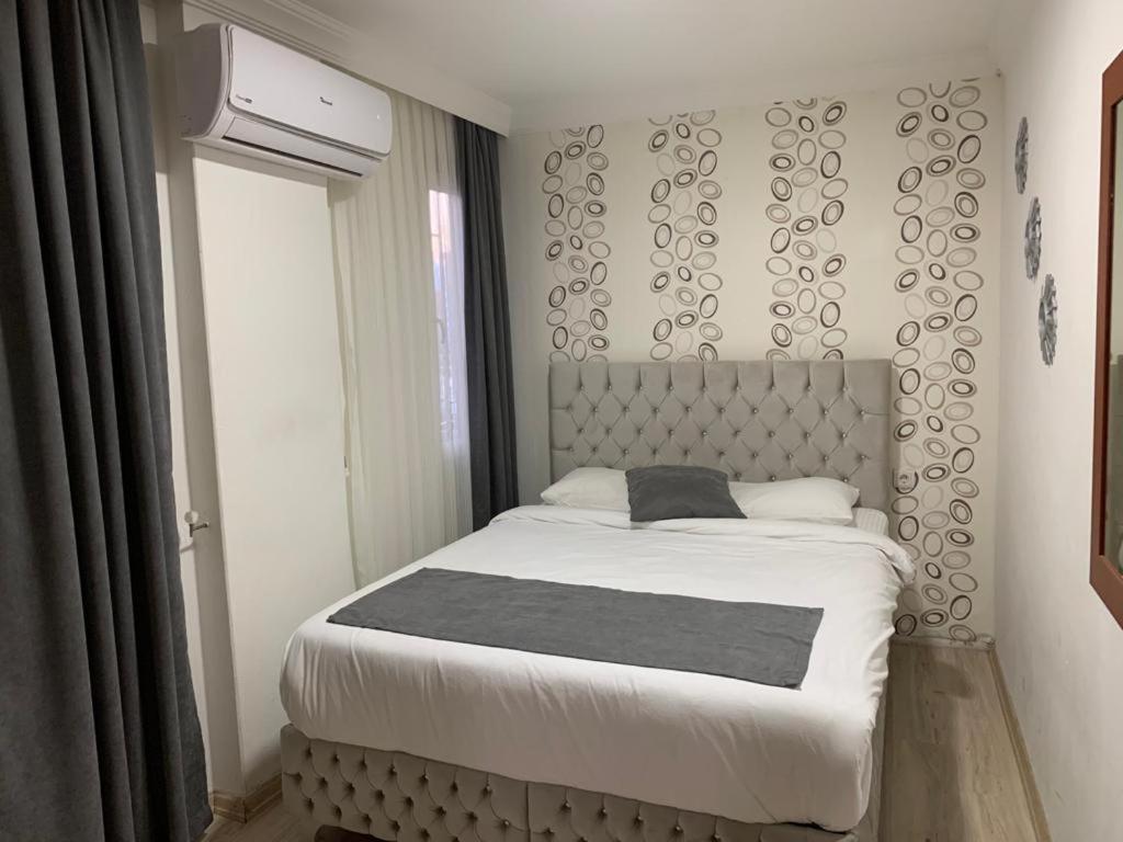 Hotelamsterdam คูซาดาซี ภายนอก รูปภาพ