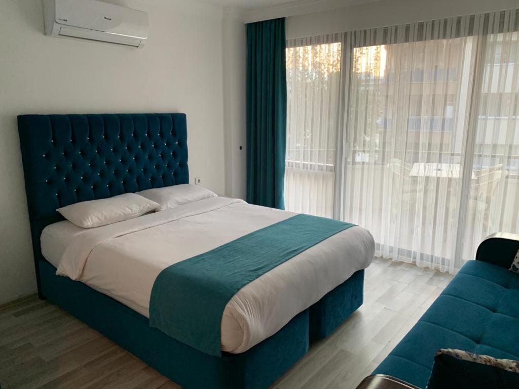 Hotelamsterdam คูซาดาซี ภายนอก รูปภาพ
