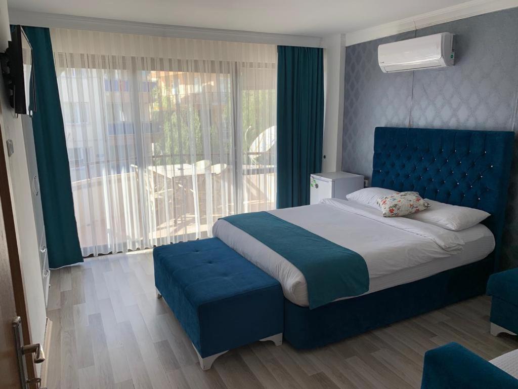 Hotelamsterdam คูซาดาซี ภายนอก รูปภาพ