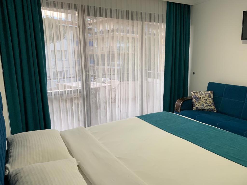 Hotelamsterdam คูซาดาซี ภายนอก รูปภาพ