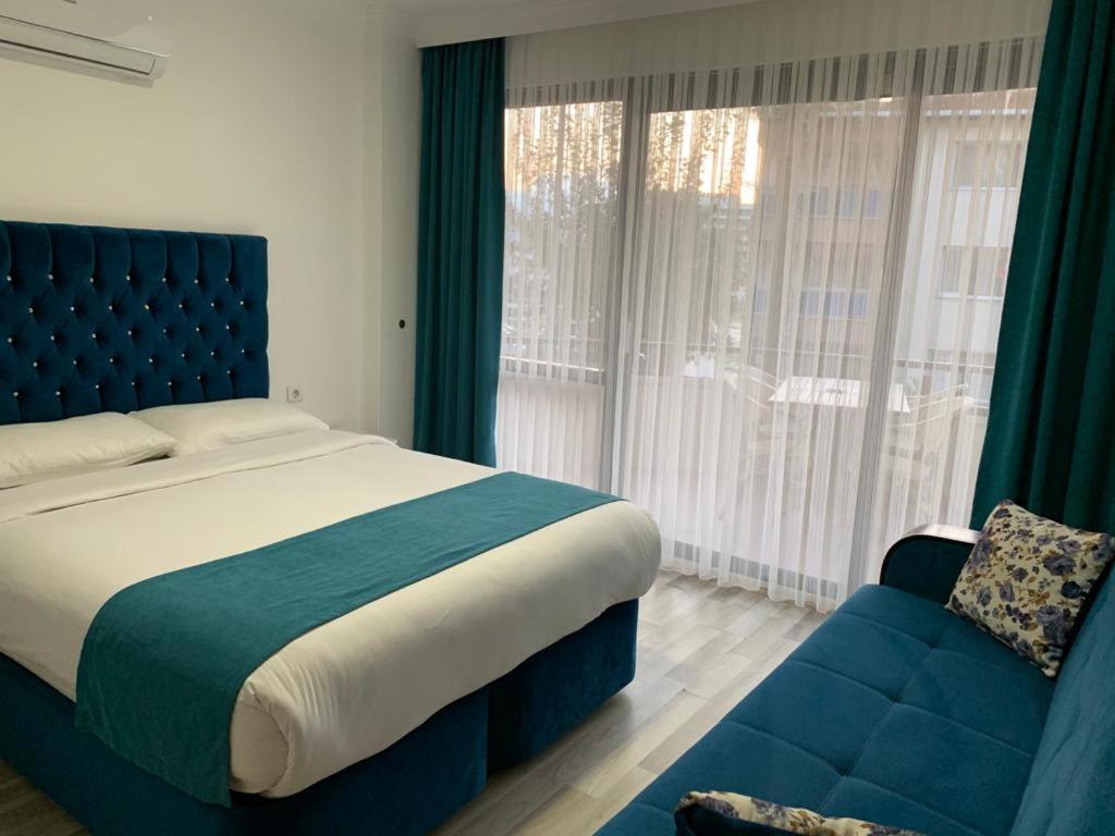 Hotelamsterdam คูซาดาซี ภายนอก รูปภาพ