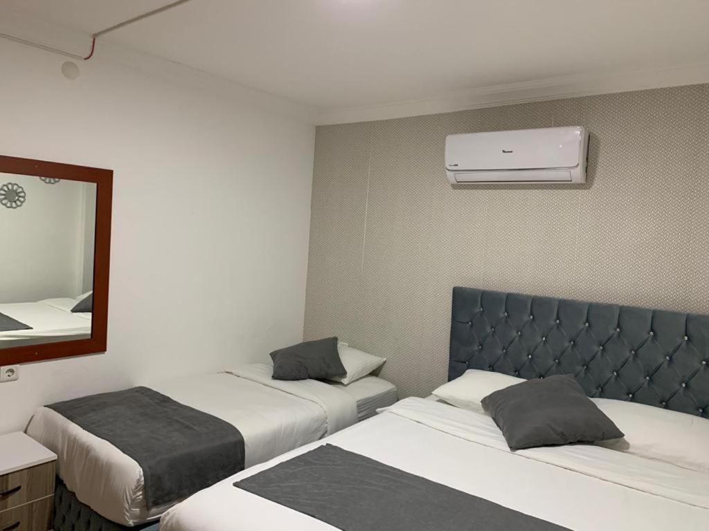 Hotelamsterdam คูซาดาซี ภายนอก รูปภาพ